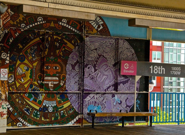A colorful mural, featuring abstract shapes and vibrant patterns.